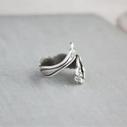 Ring med kolibri og blomst