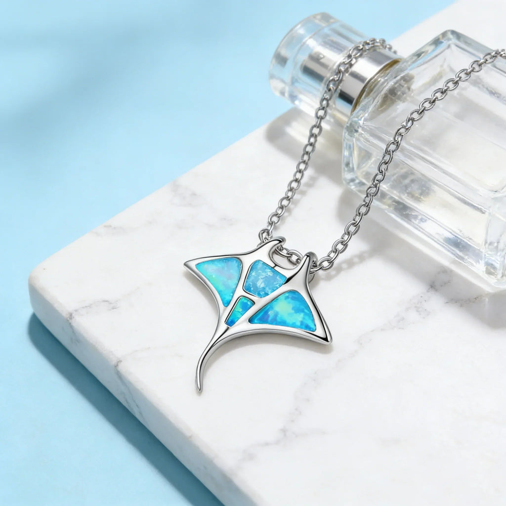 Halskjede mantarokke med blå opal
