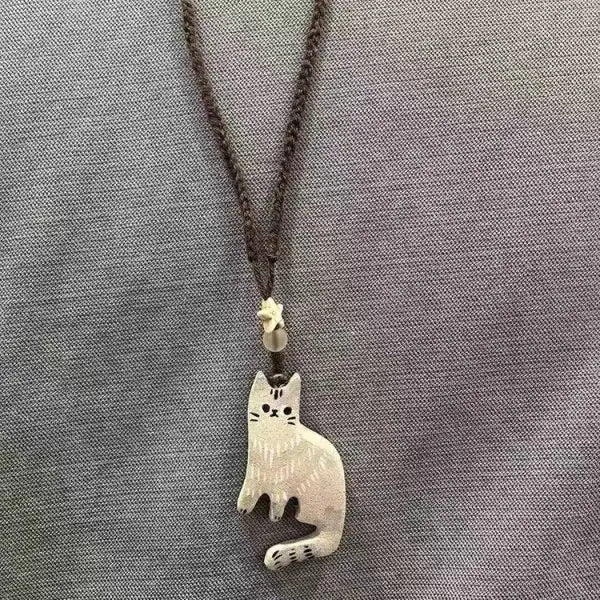 Vintage halskjede med anheng av katt og stjerne
